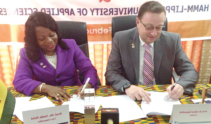 The Vice-Chancellor of KTU, Prof. Smile Dzisi (right), and the President of Hamm-Lippstadt University of Applied Sciences (HSHL), signing the MoU